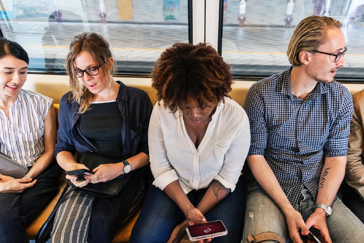 young people commuting on train