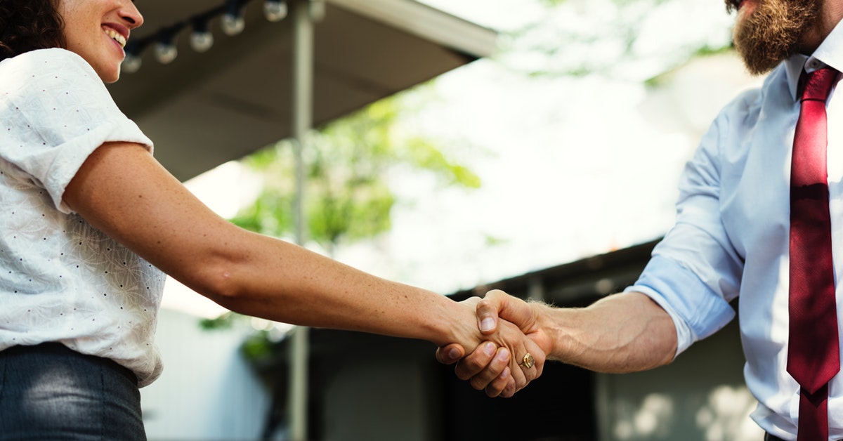 people shaking hands