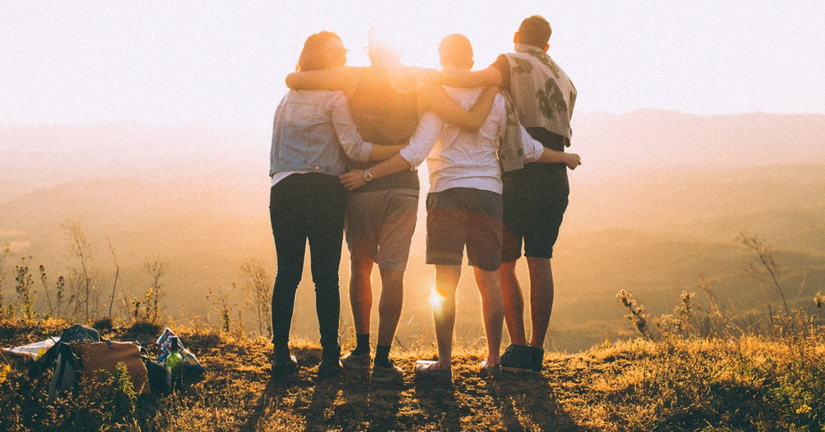 A group of friends embracing