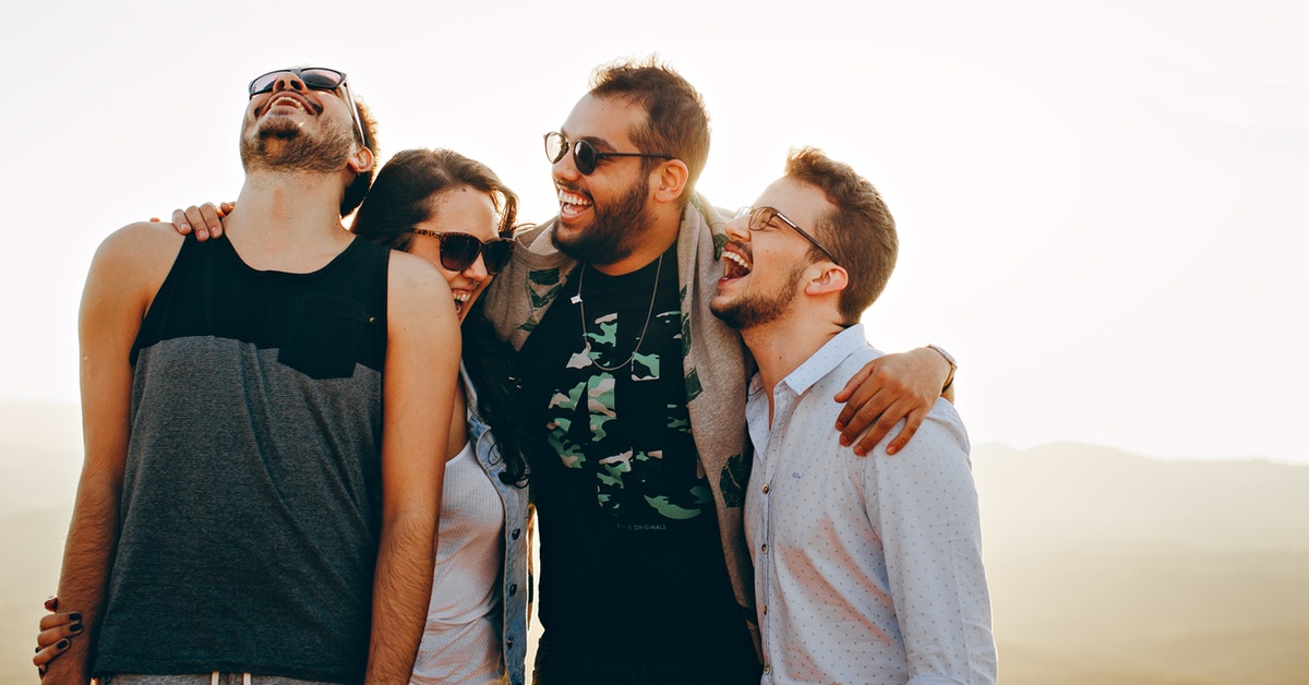 a group of teenagers laughing