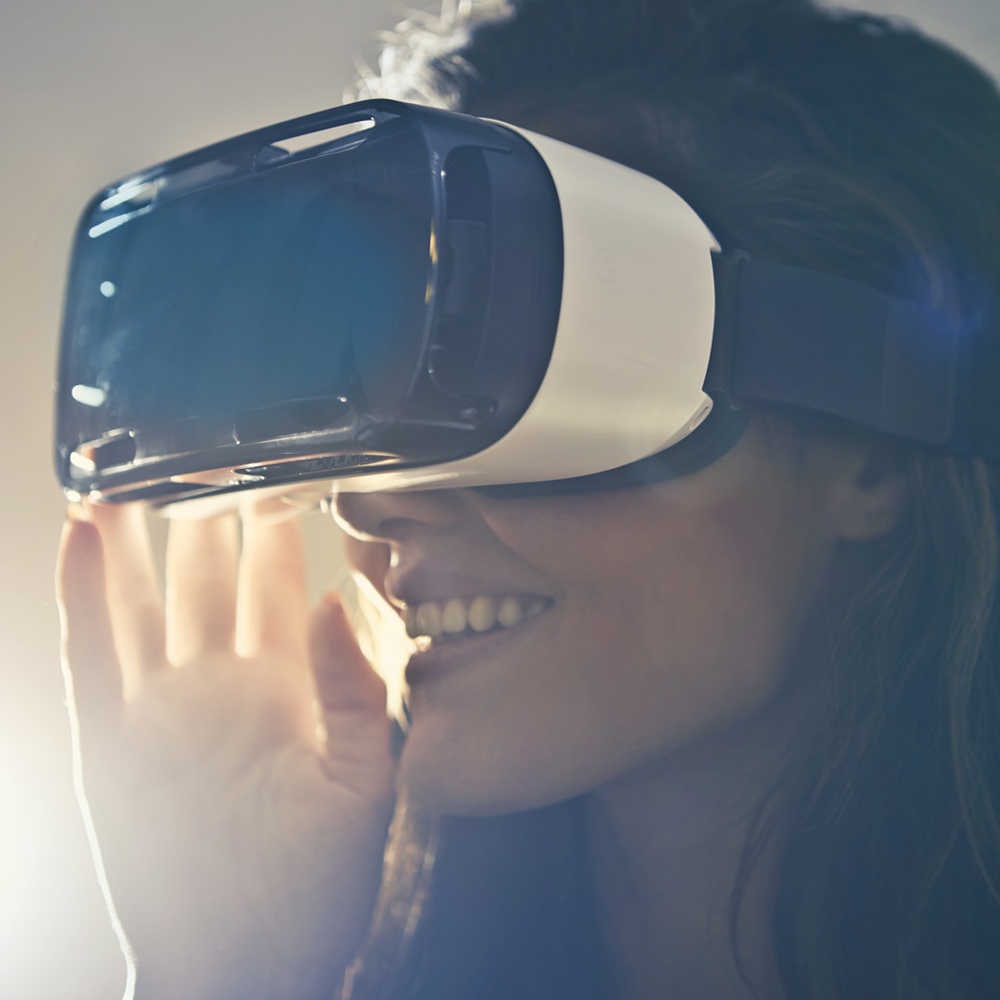 Woman wearing Virtual Reality goggles